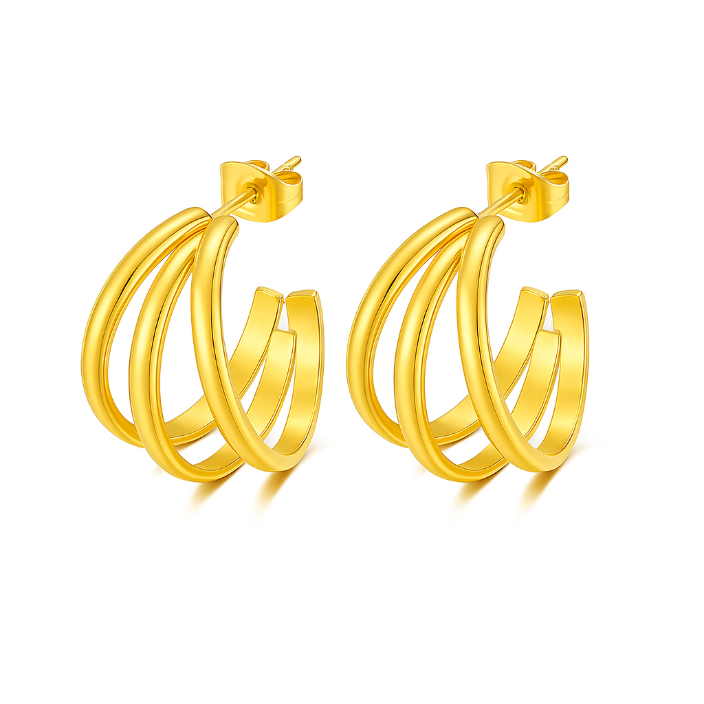 Aretes Nicole – Argollas medianas entrelazadas en dorado y plateado elegante.