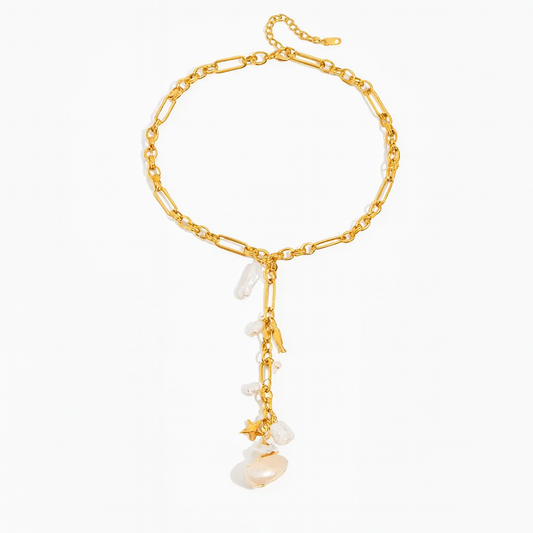 Collar Ariel – Diseño Tipo “Y” en Titanio Dorado con Perlas Naturales y Dijes Marinos