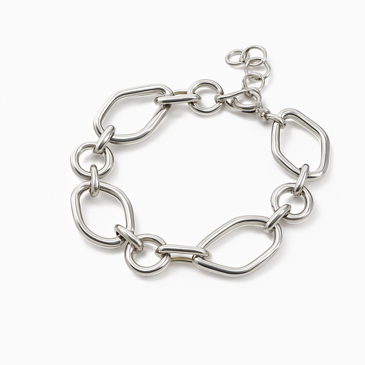 Brazalete Lucy Plateado de Eslabones Irregulares – Acero de Titanio