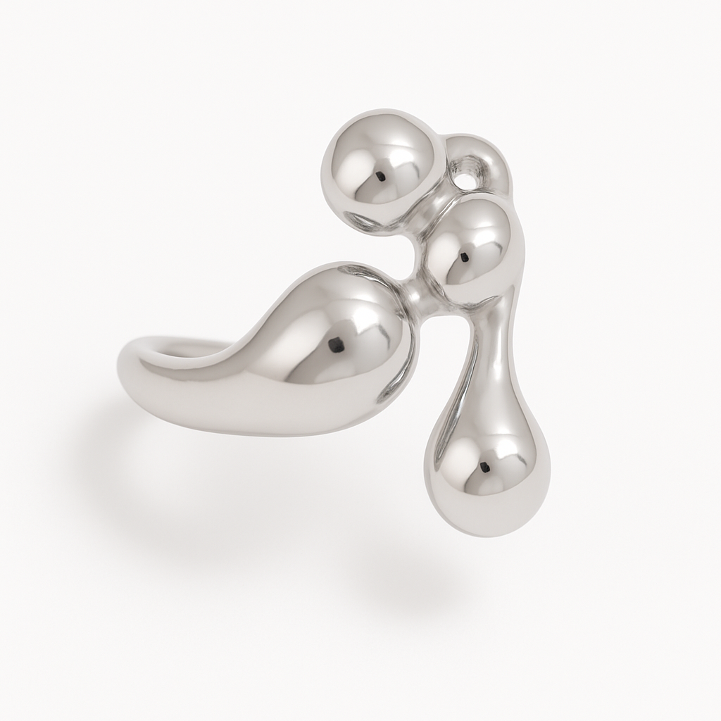 Anillo Gota Escultural de Acero de Titanio Diseño Orgánico y Minimalista