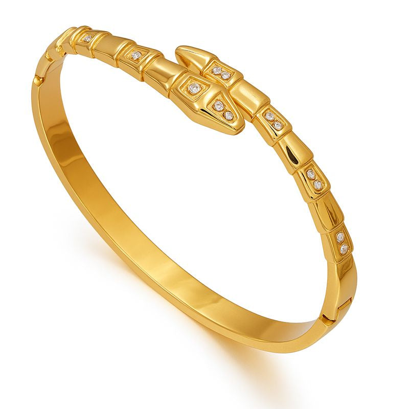 Brazalete Serpiente – Diseño Escultórico en Dorado con Textura de Escamas y Detalles de Cristales