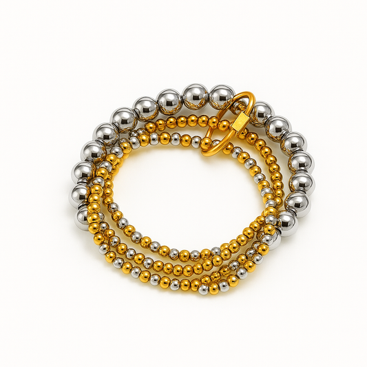 Brazalete Savage – Diseño Moderno en Esferas Plateadas y Aro Dorado Texturizado