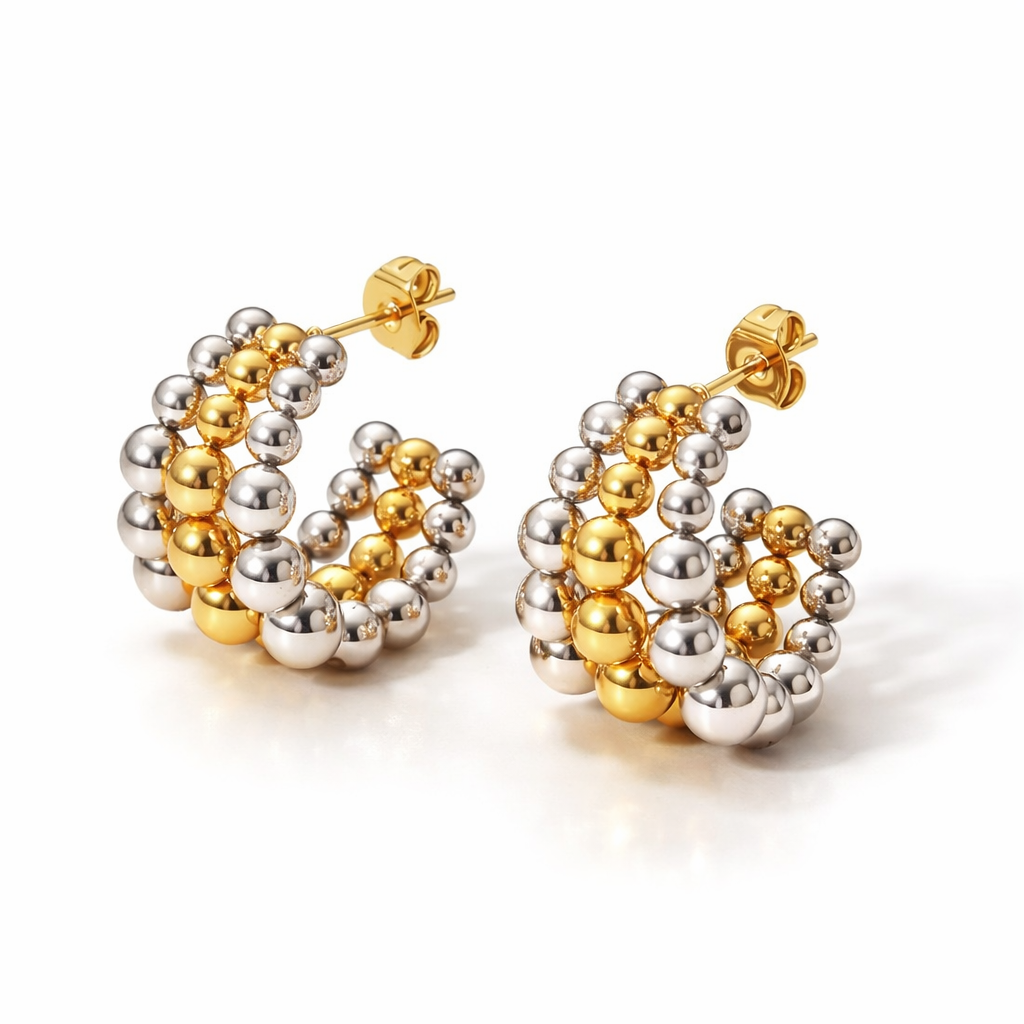 Aretes Bubble Hoops – Argollas Volumétricas con Esferas Pulidas en Acero de Titanio