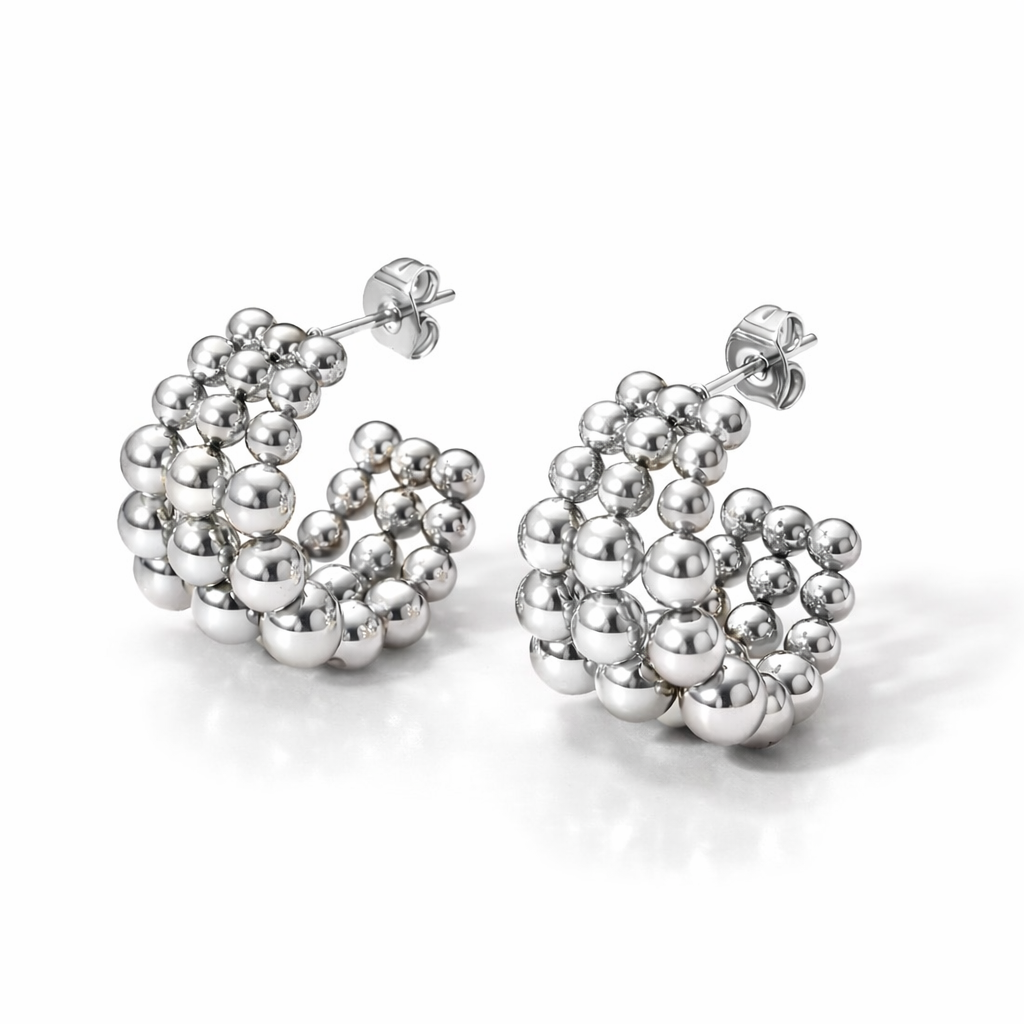 Aretes Bubble Hoops – Argollas Volumétricas con Esferas Pulidas en Acero de Titanio