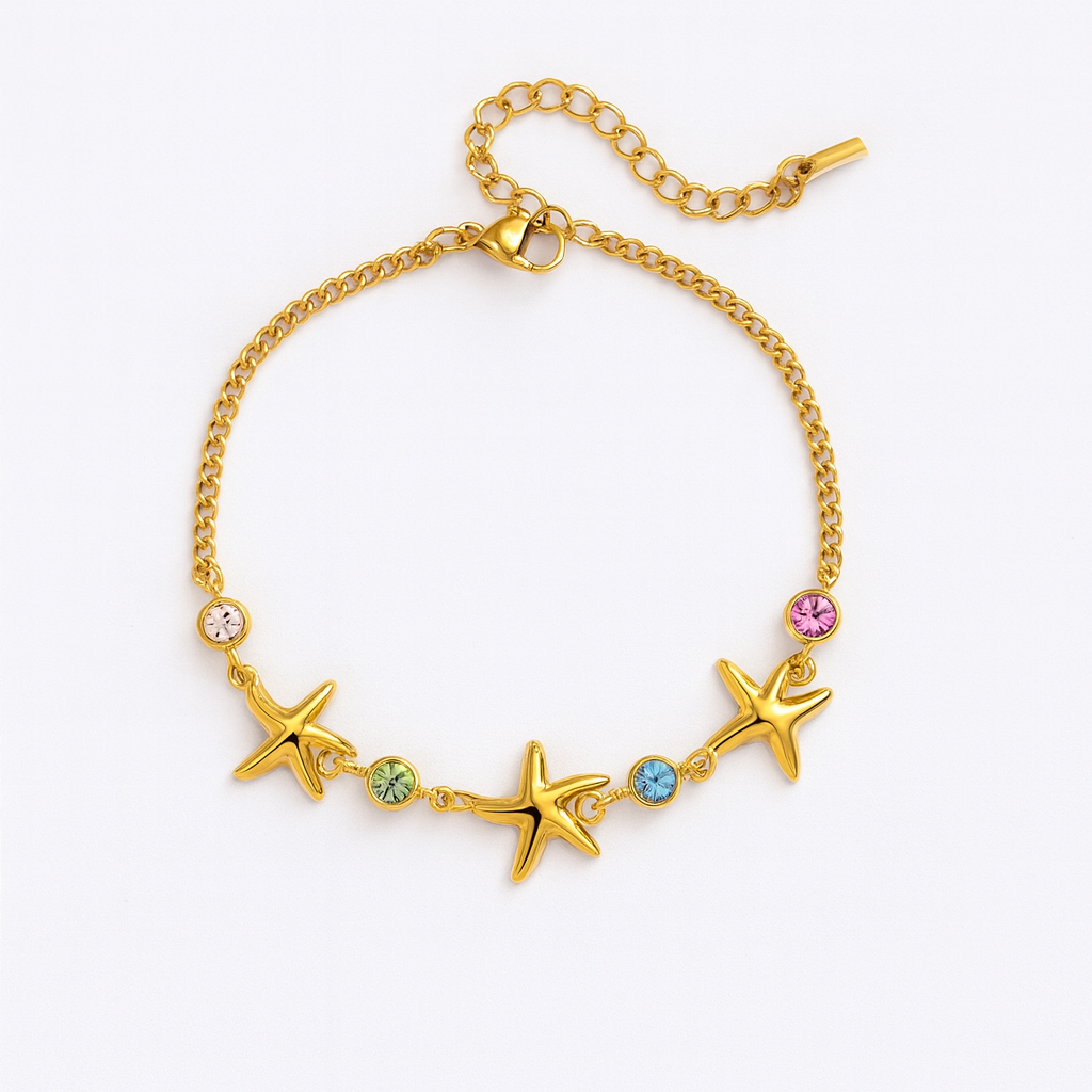 Brazalete Nacazcolo – Diseño Marino con Estrellas de Mar y Cristales Pastel en Cadena Dorada
