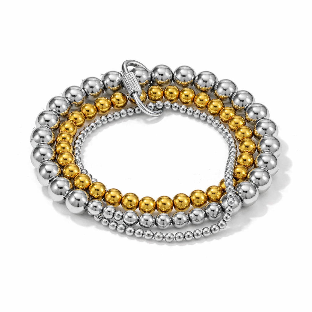 Brazalete Savage – Diseño Moderno en Esferas Plateadas y Aro Dorado Texturizado