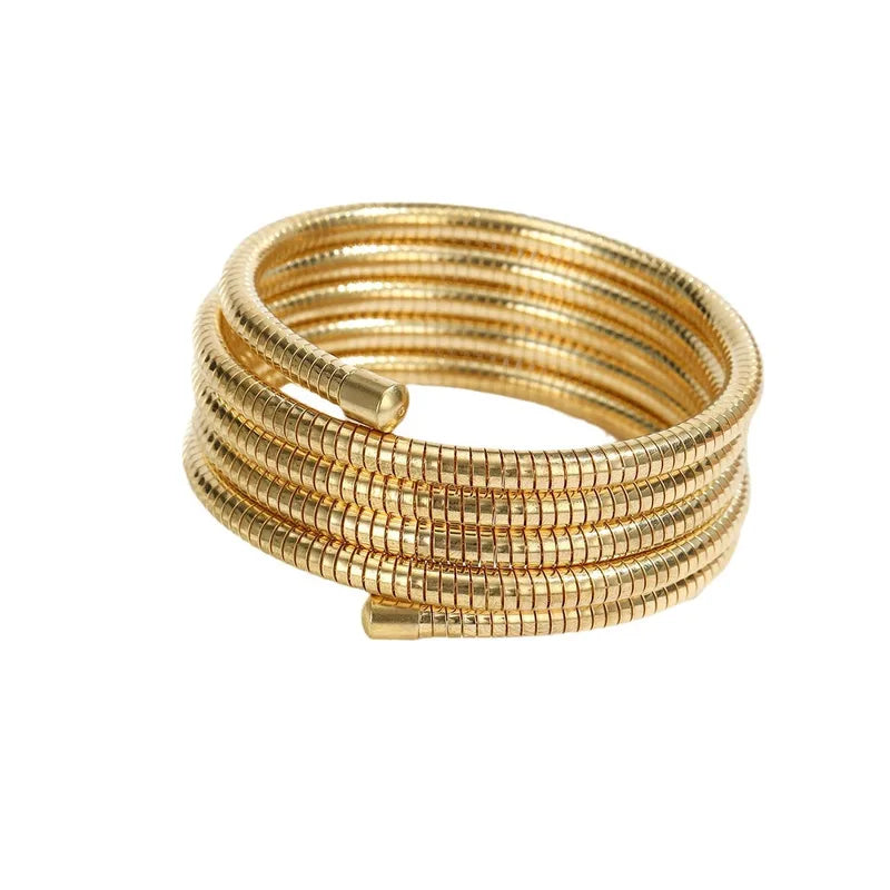 Brazalete Spiral de Acero Dorado – Diseño en Espiral Minimalista y Ligero