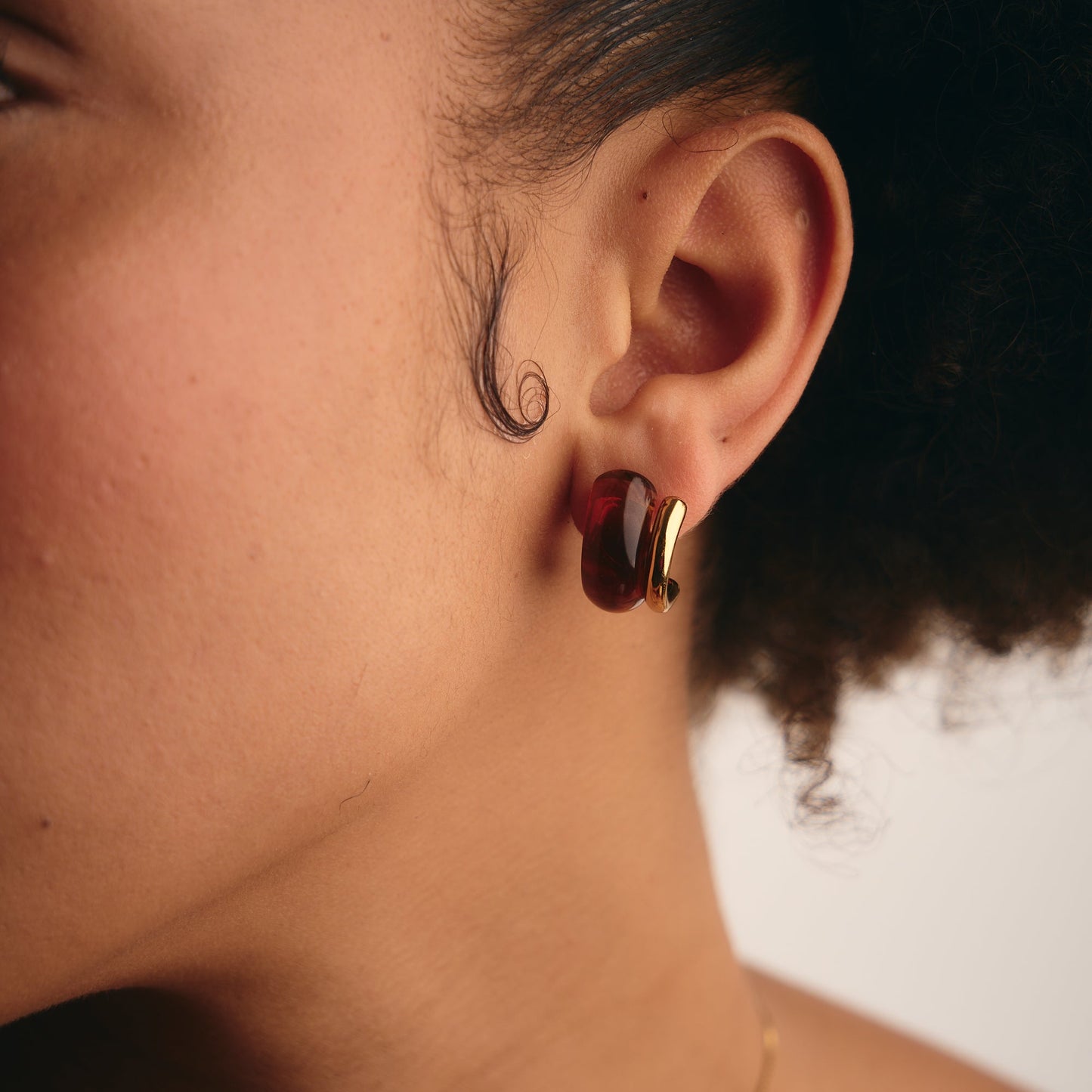 Aretes Curva Ámbar Dorado Acero 316L (Pequeñas)