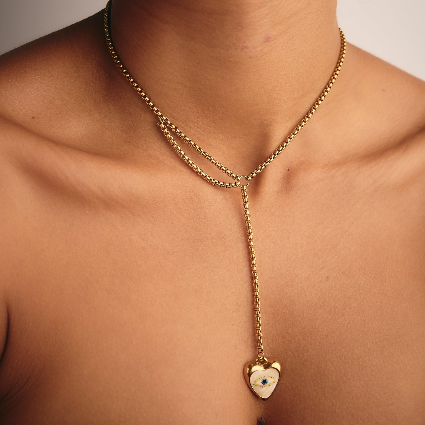 Collar Ojo Dorado de Doble Caída con Corazón